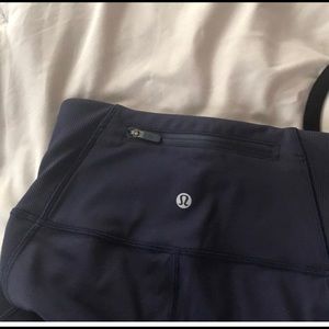 Navy lulu lemon capris. Never worn. Sz 2.